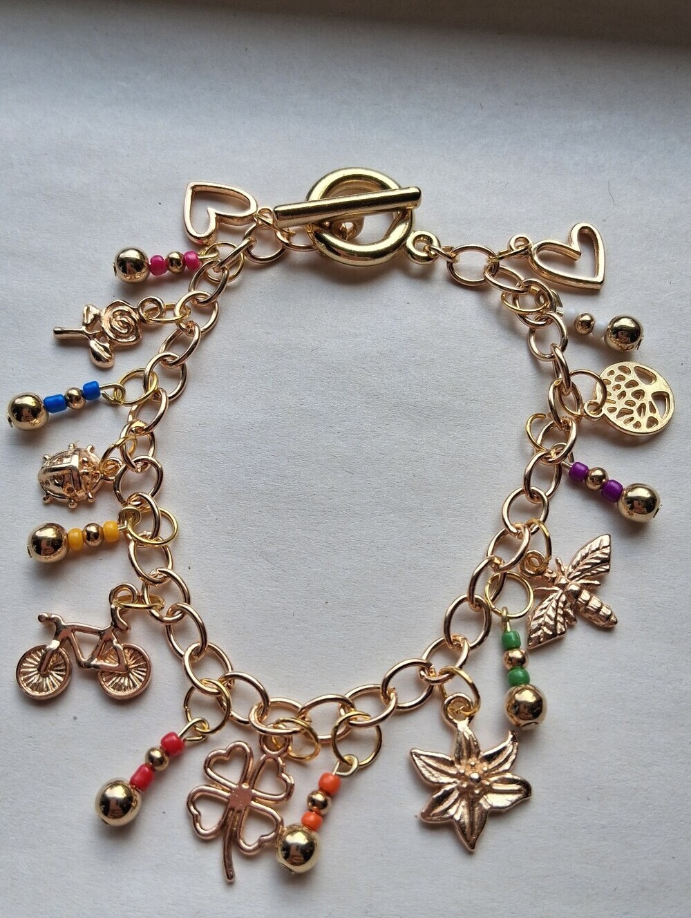 Hand Crafted Gold Charm Bracelet with Multicolor Beads